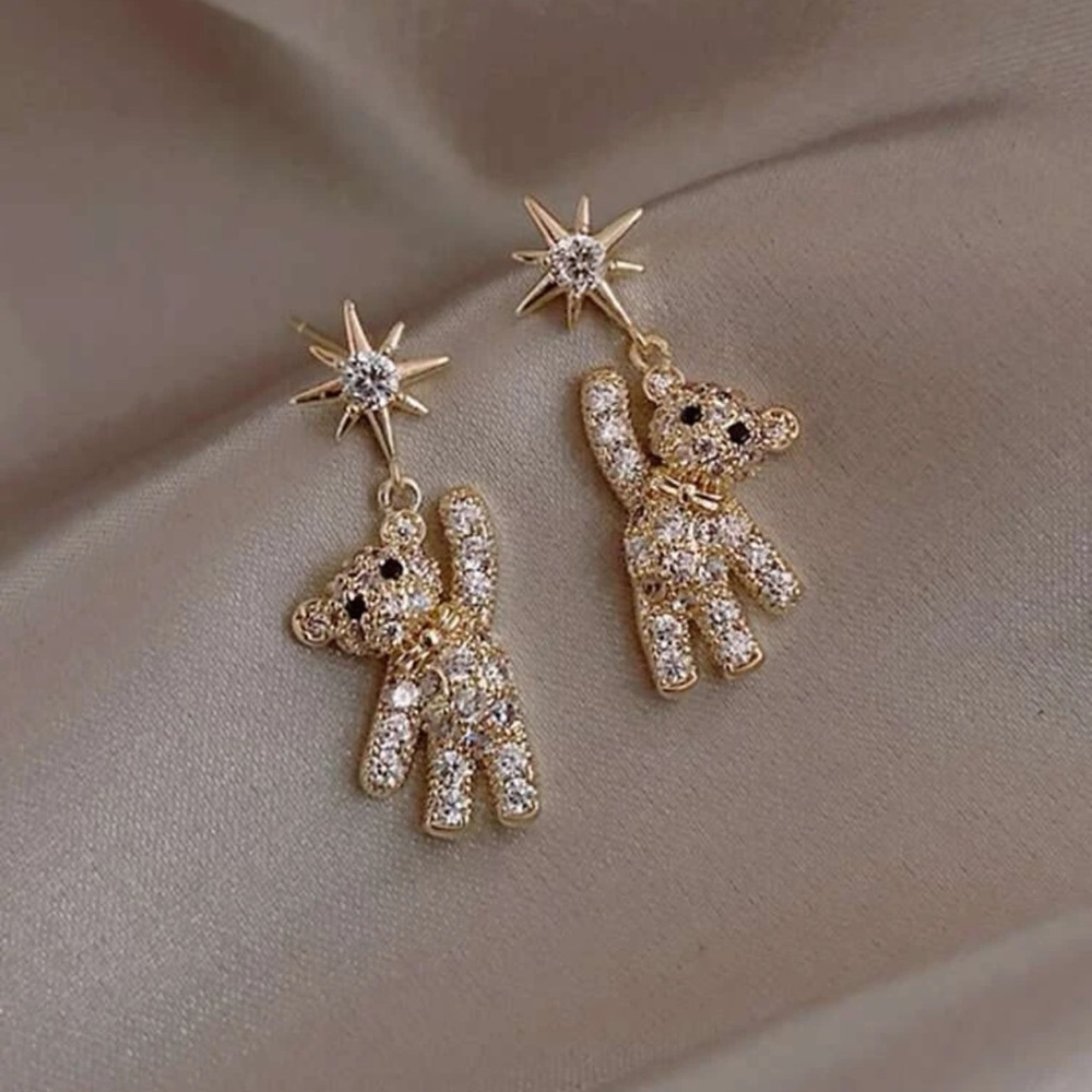 Rhinestone bear holding a star